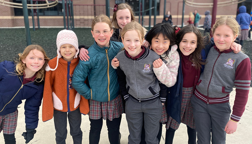 Fourth grade girls wearing winter clothing