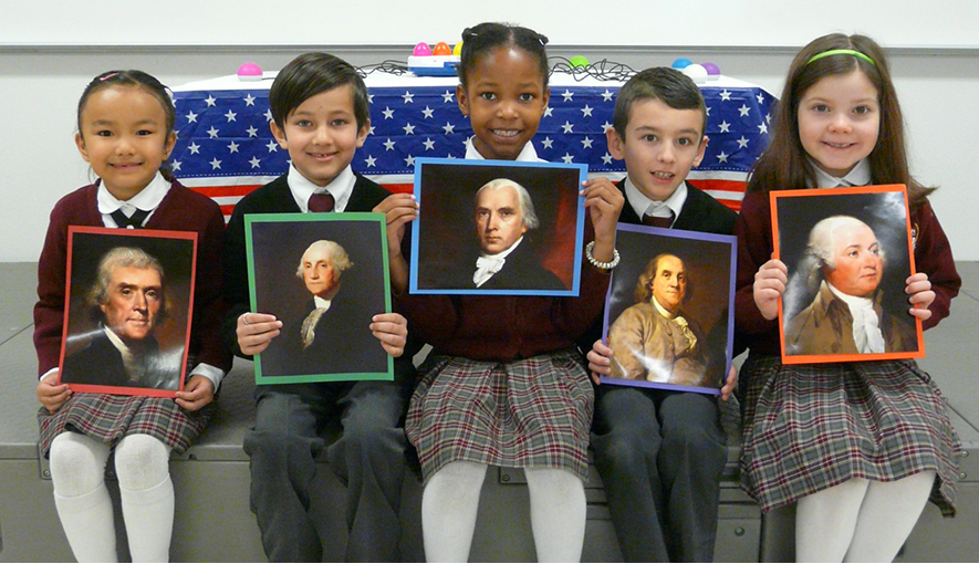 Group of elementary students participating in the Founders Assembly